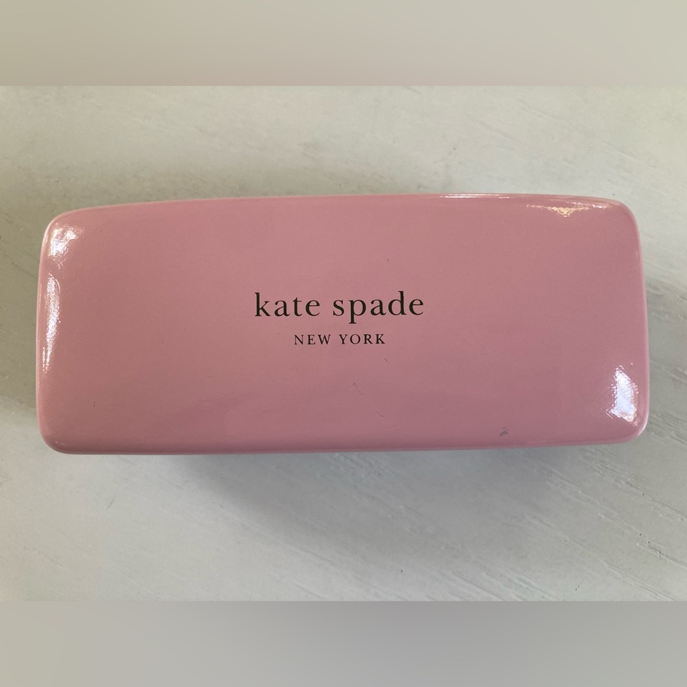 Pink and green kate spade glasses case.